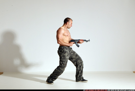 Man Adult Athletic White Fighting with submachine gun Moving poses Pants