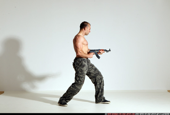 Man Adult Athletic White Fighting with submachine gun Moving poses Pants