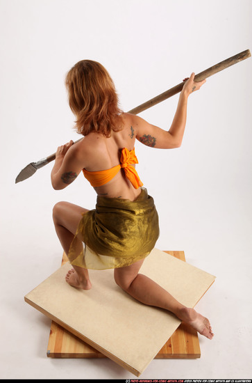 Woman Adult Athletic White Fighting with spear Kneeling poses Army