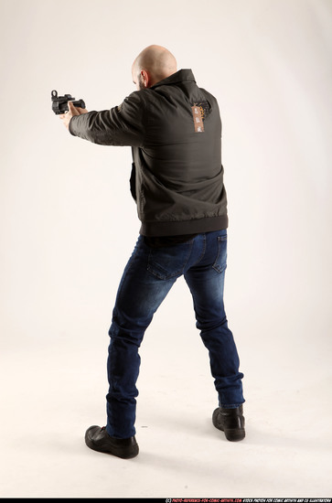 Man Adult Athletic White Fighting with gun Standing poses Jacket