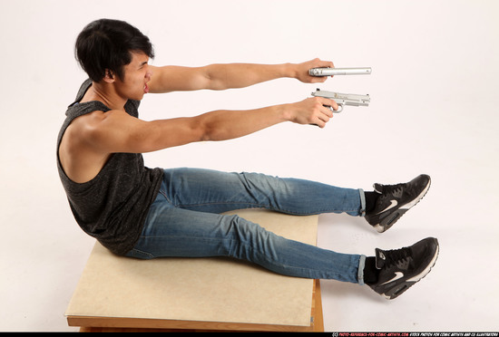 Man Young Athletic Fighting with gun Sitting poses Casual Latino