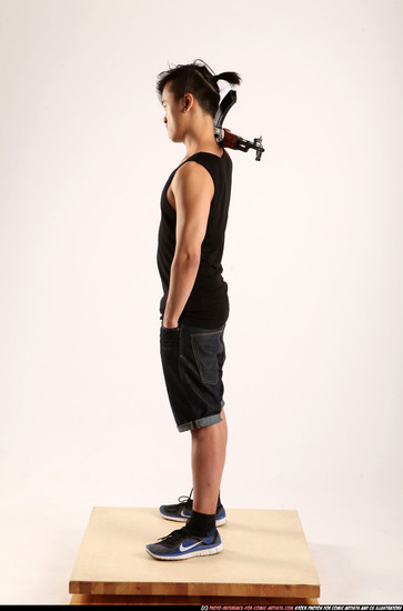 Man Young Athletic Fighting with submachine gun Standing poses Casual Asian