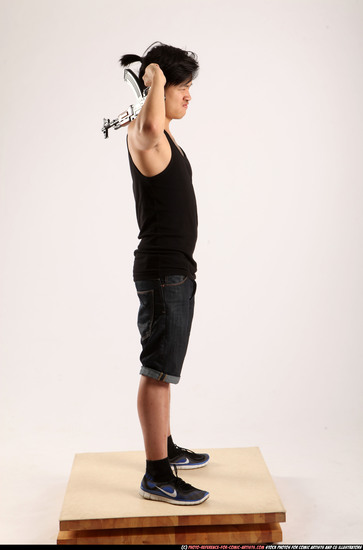 Man Young Athletic Fighting with submachine gun Standing poses Casual Asian