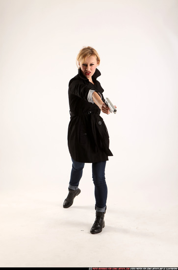 Woman Adult Athletic White Fighting with gun Standing poses Coat