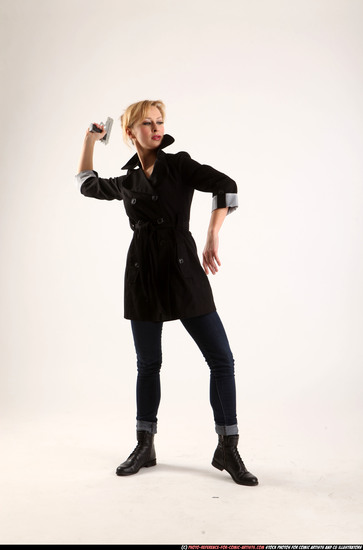 Woman Adult Athletic White Fighting with gun Standing poses Coat