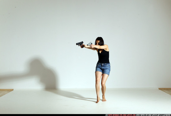 Woman Young Athletic White Fighting with gun Moving poses Casual