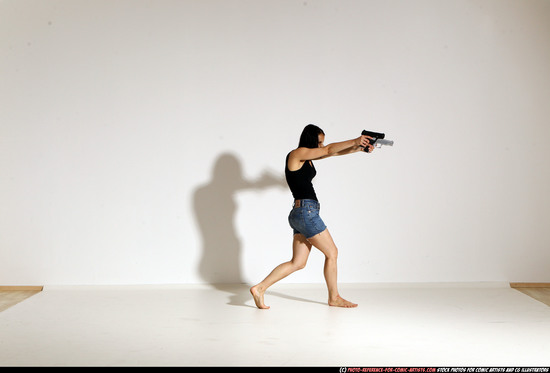 Woman Young Athletic White Fighting with gun Moving poses Casual