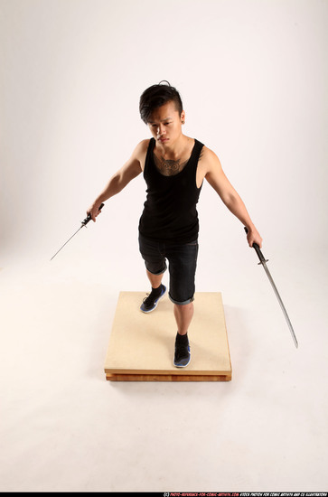 Man Young Athletic Fighting with sword Standing poses Casual Asian