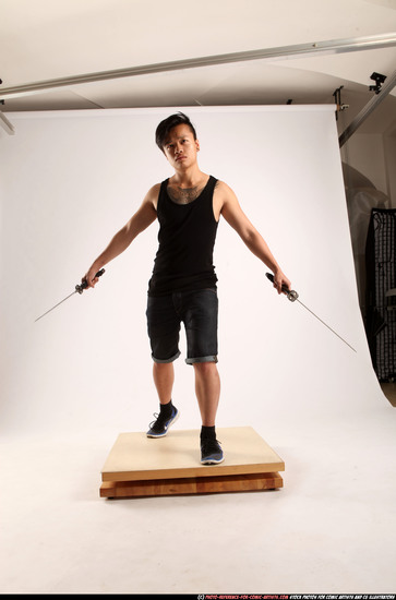 Man Young Athletic Fighting with sword Standing poses Casual Asian