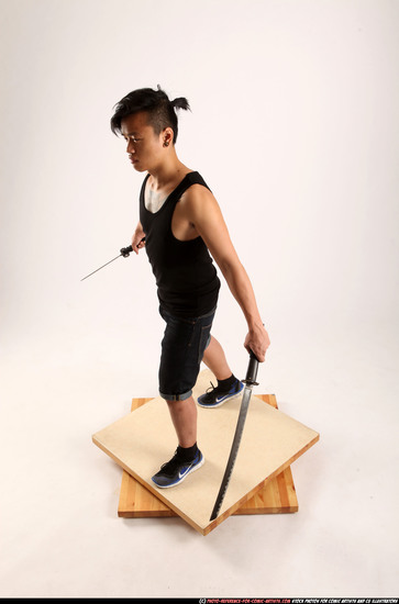 Man Young Athletic Fighting with sword Standing poses Casual Asian