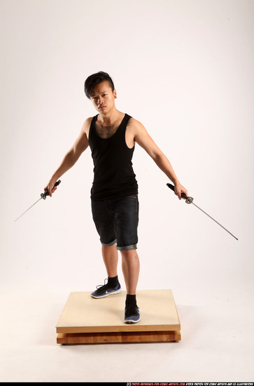 Man Young Athletic Fighting with sword Standing poses Casual Asian