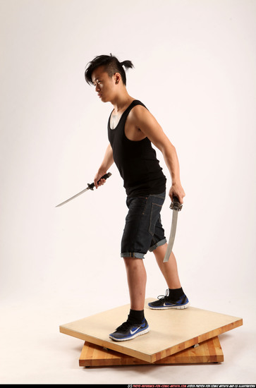 Man Young Athletic Fighting with sword Standing poses Casual Asian