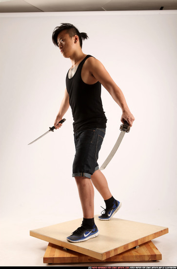 Man Young Athletic Fighting with sword Standing poses Casual Asian