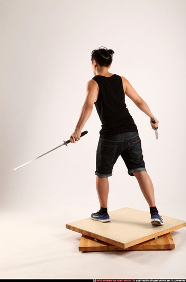 Man Young Athletic Fighting with sword Standing poses Casual Asian