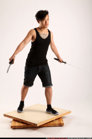 Man Young Athletic Fighting with sword Standing poses Casual Asian