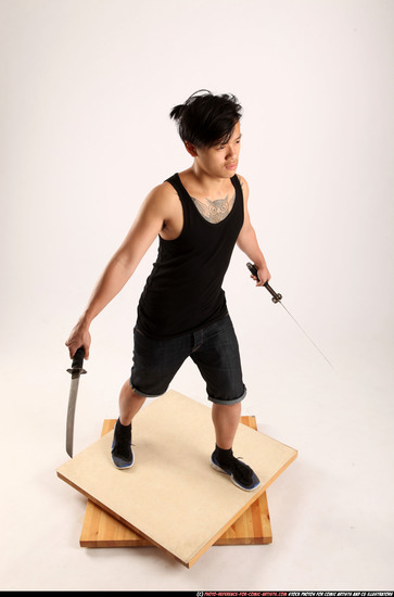 Man Young Athletic Fighting with sword Standing poses Casual Asian