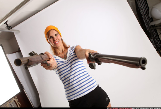 Woman Adult Athletic White Fighting with gun Standing poses Army