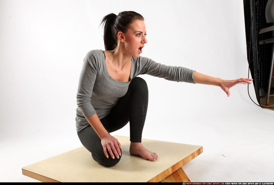 Woman Young Athletic White Daily activities Kneeling poses Casual