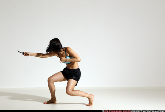 Woman Young Athletic White Fighting with knife Moving poses Casual