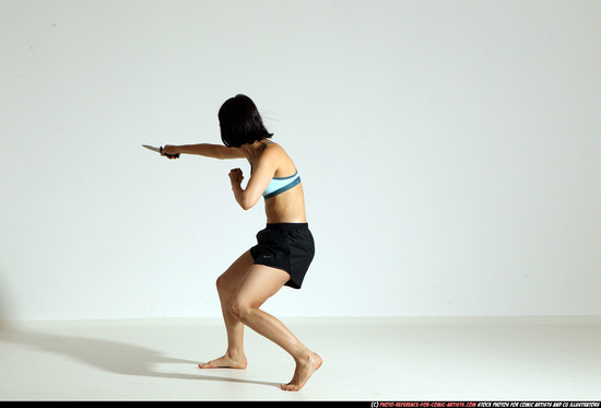 Woman Young Athletic White Fighting with knife Moving poses Casual