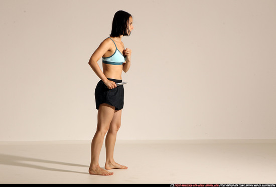 Woman Young Athletic White Fighting with knife Moving poses Casual