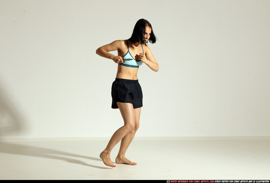 Woman Young Athletic White Fighting with knife Moving poses Casual