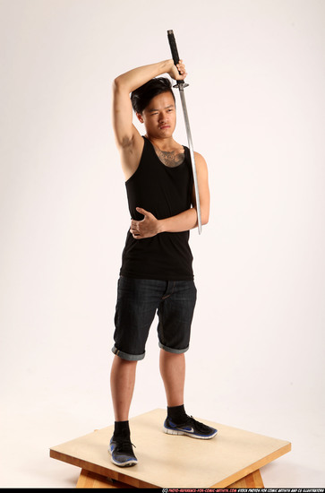 Man Young Athletic Fighting with sword Standing poses Casual Asian