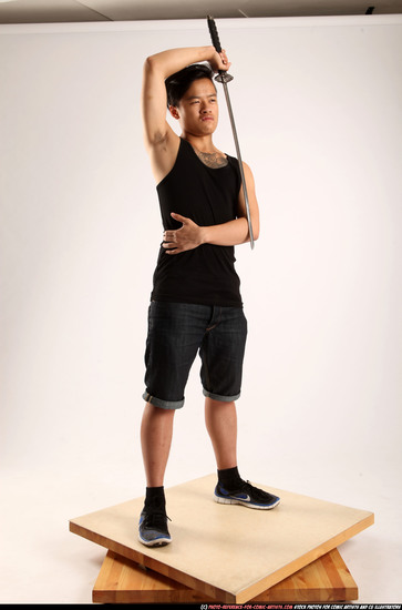 Man Young Athletic Fighting with sword Standing poses Casual Asian