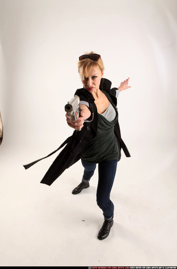 Woman Adult Athletic White Fighting with gun Standing poses Coat