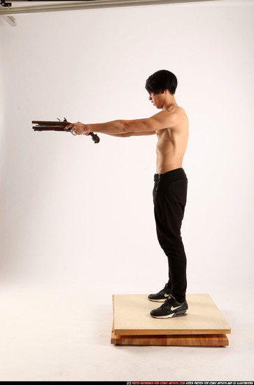 Man Young Athletic Fighting with gun Standing poses Pants Asian