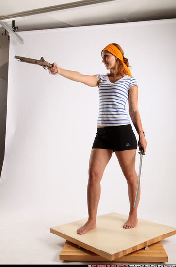 Woman Adult Athletic White Fighting with gun Standing poses Army