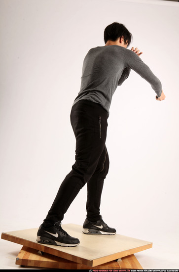 Man Young Athletic Fighting with knife Standing poses Casual Asian