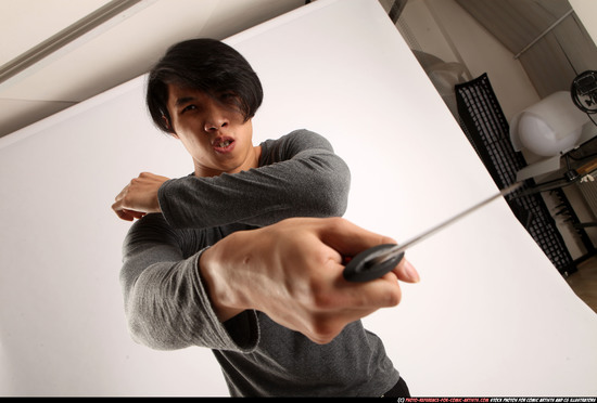 Man Young Athletic Fighting with knife Standing poses Casual Asian