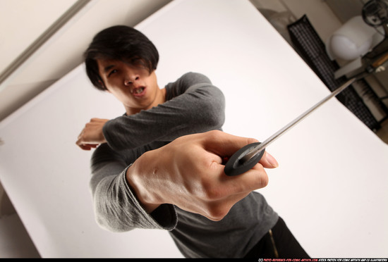 Man Young Athletic Fighting with knife Standing poses Casual Asian