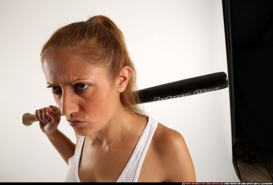 Woman Adult Athletic White Standing poses Casual Fighting with bat