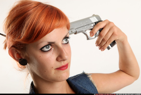 Woman Adult Athletic White Fighting with gun Standing poses Casual