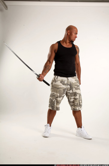 Man Adult Athletic Black Fighting with sword Standing poses Army