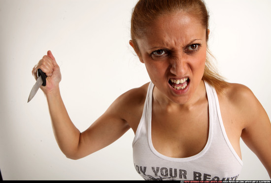 Woman Adult Athletic White Fighting with knife Standing poses Casual