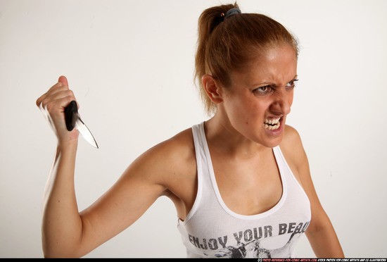 Woman Adult Athletic White Fighting with knife Standing poses Casual