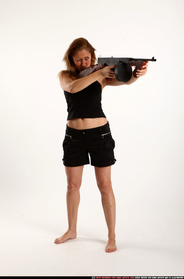 Woman Adult Athletic White Fighting with submachine gun Standing poses Casual