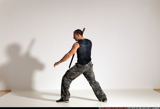 Man Adult Athletic White Fighting with sword Moving poses Casual