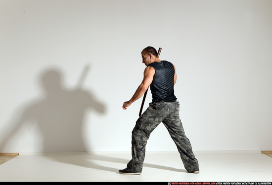 Man Adult Athletic White Fighting with sword Moving poses Casual