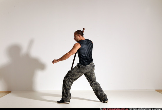 Man Adult Athletic White Fighting with sword Moving poses Casual