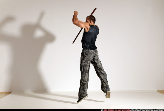 Man Adult Athletic White Fighting with sword Moving poses Casual