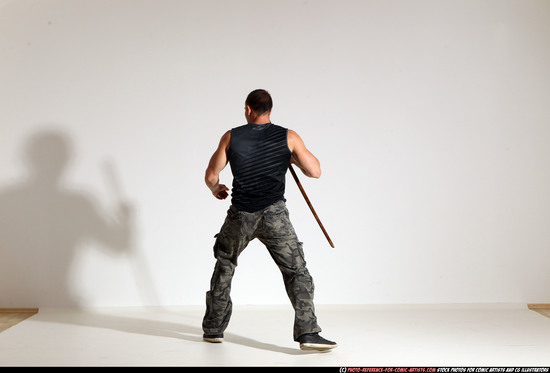 Man Adult Athletic White Fighting with sword Moving poses Casual