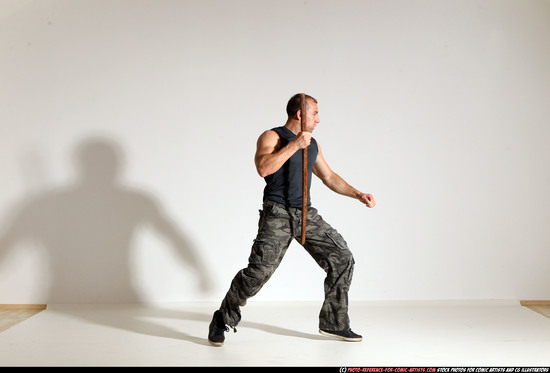 Man Adult Athletic White Fighting with sword Moving poses Casual