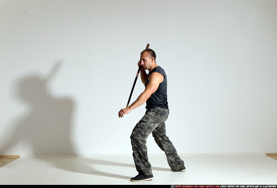 Man Adult Athletic White Fighting with sword Moving poses Casual