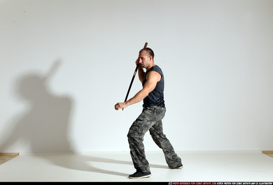 Man Adult Athletic White Fighting with sword Moving poses Casual