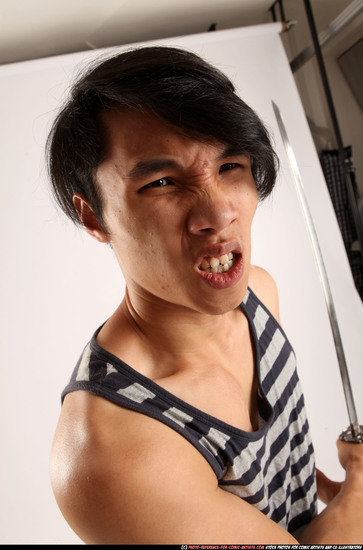 Man Young Athletic Fighting with sword Standing poses Casual Asian