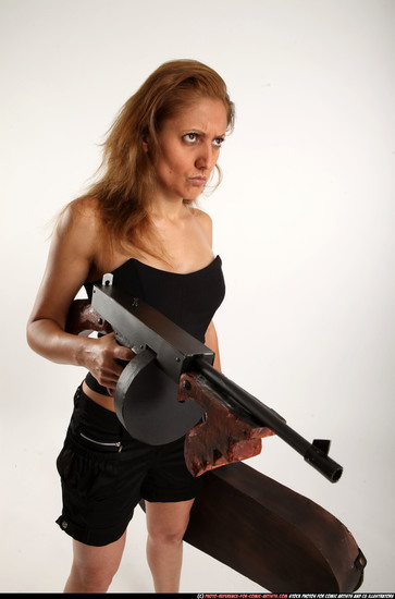 Woman Adult Athletic White Fighting with submachine gun Standing poses Casual